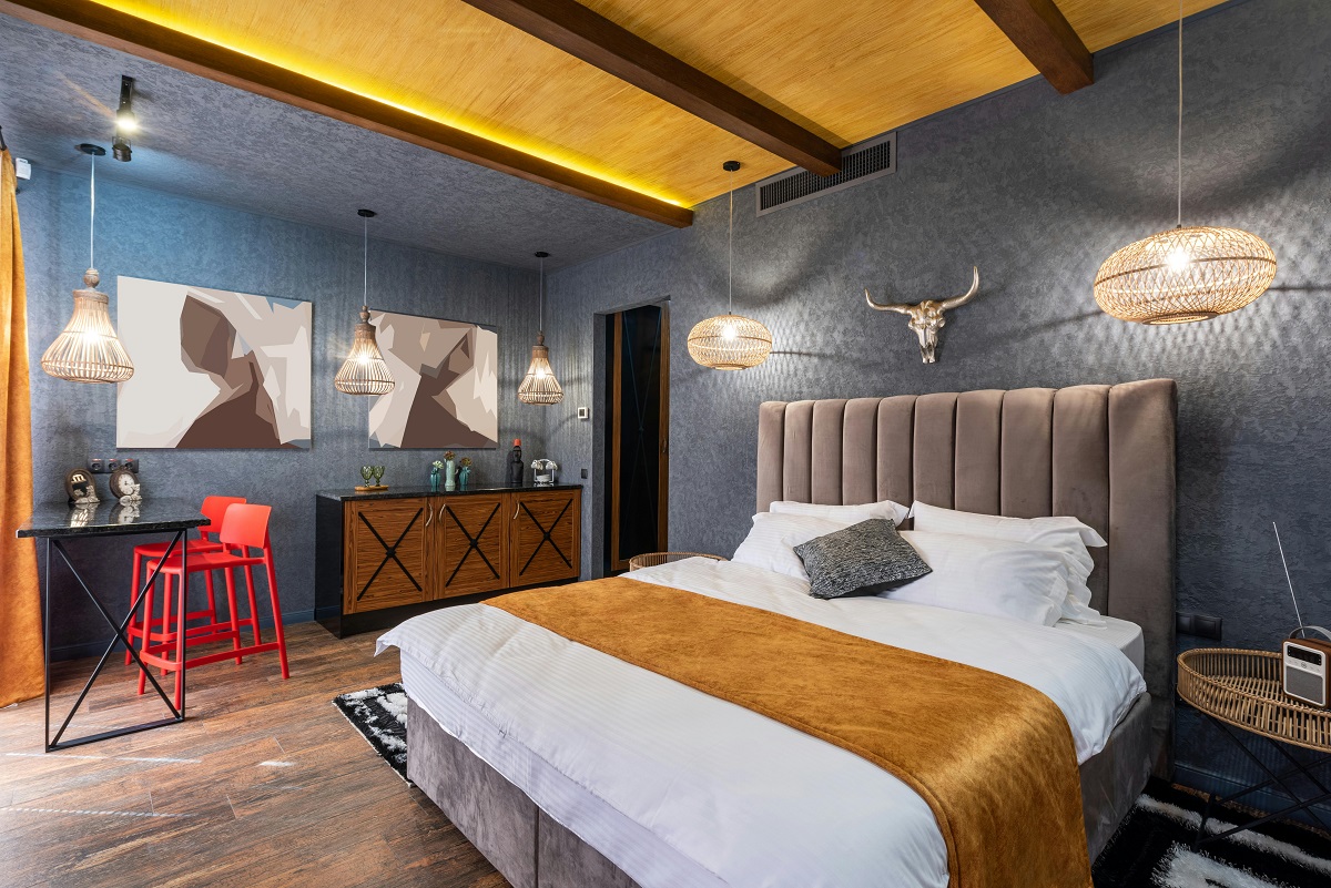 bedroom with modern artwork